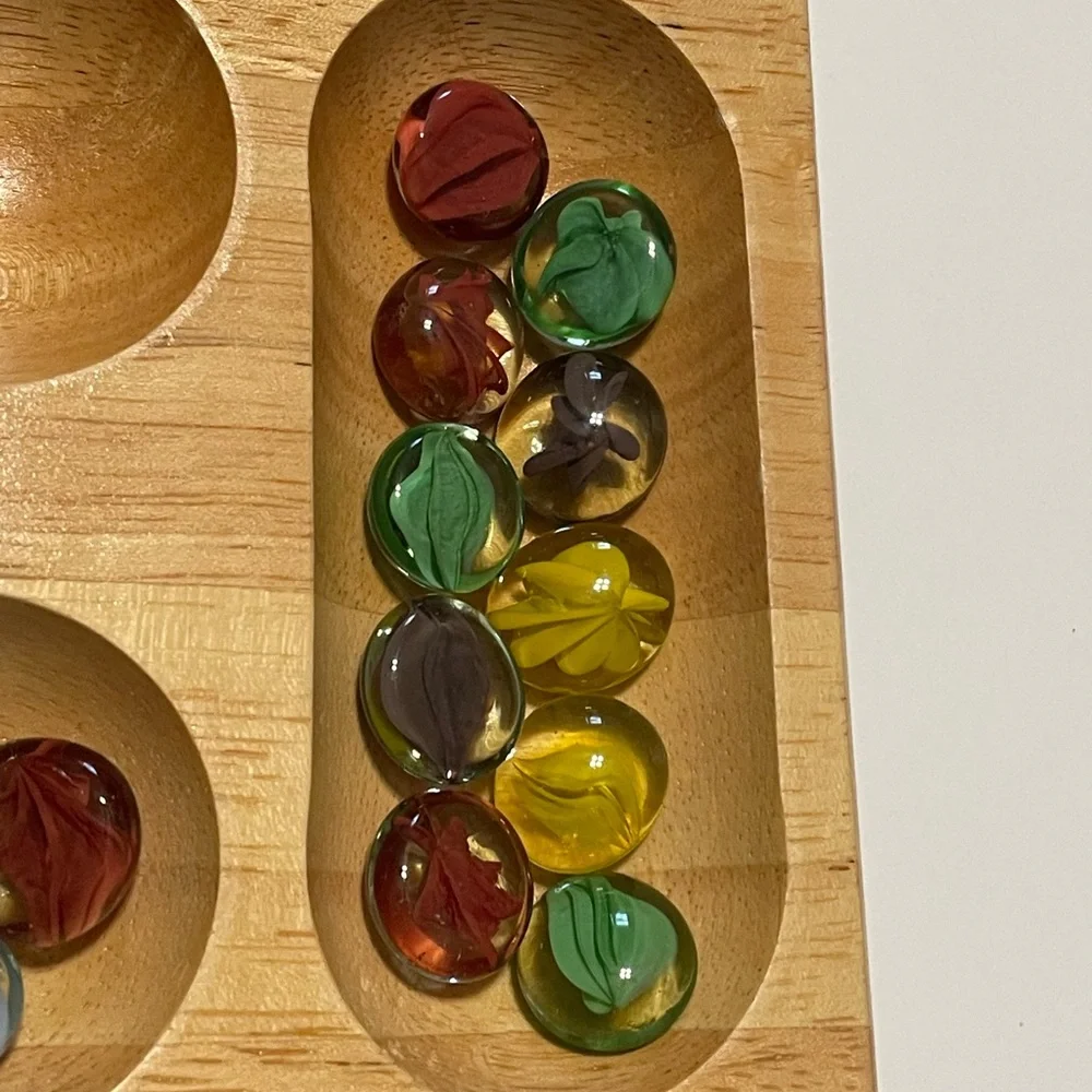 Folding Wooden Mancala Game with Colorful Stones In Metal Box